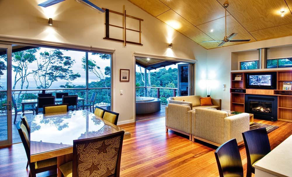 Mountain Villa Internal- lounge, dining, balcony and spa. Image By Oreillys Rainforest Retreat